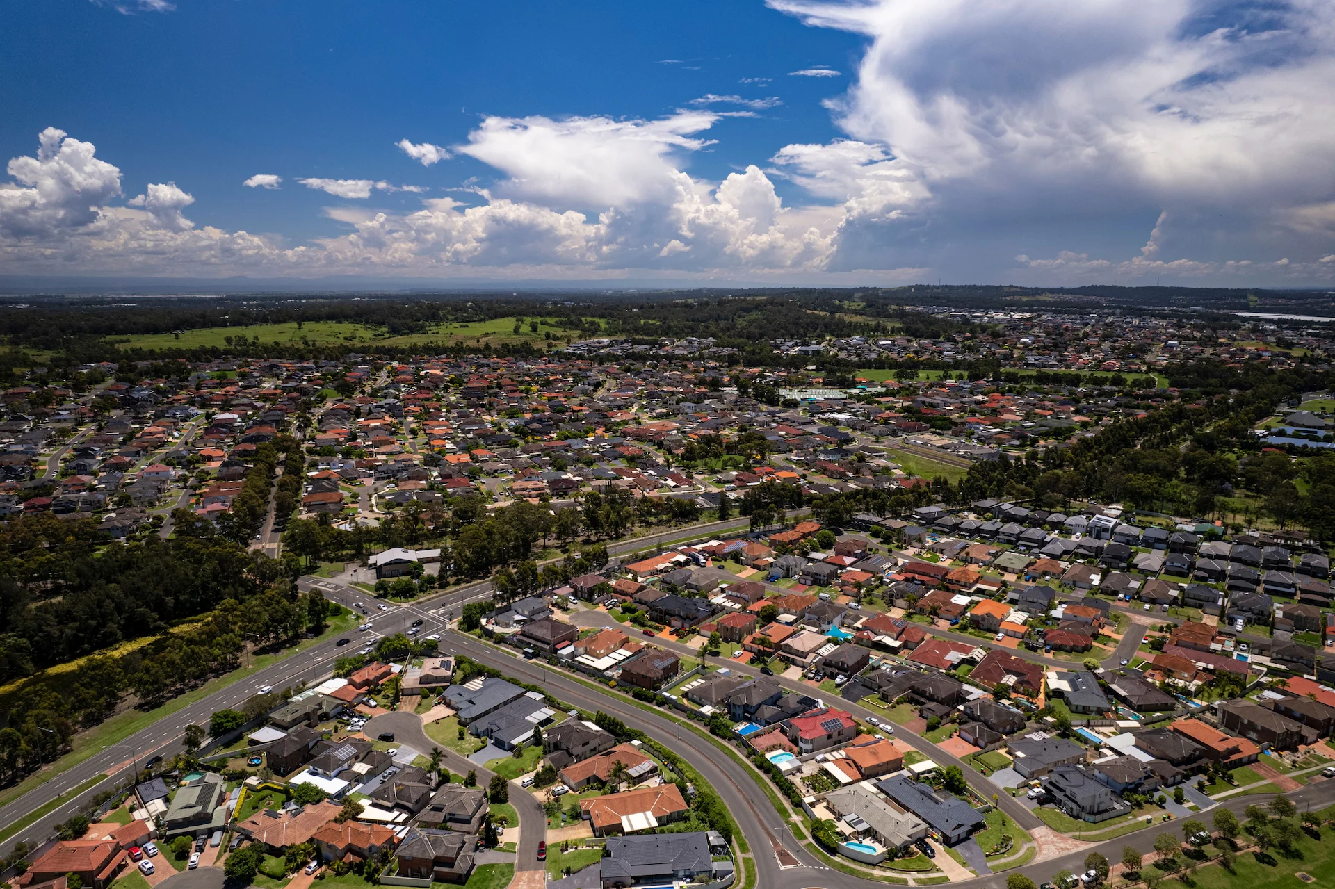 Aerial view of Western Sydney residential suburbs representing property market experience by Greater Parramatta Finance
